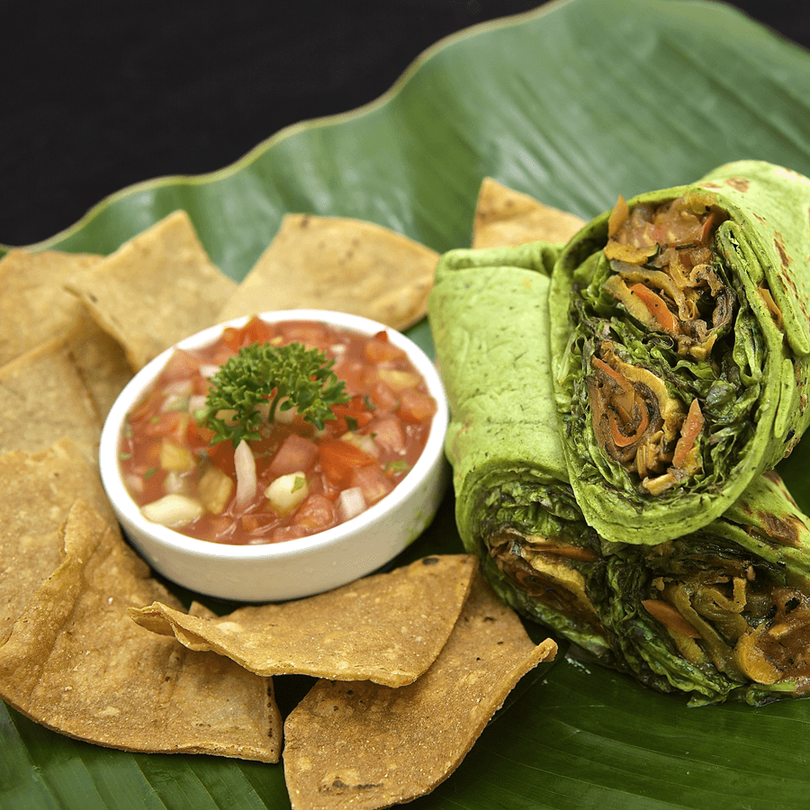 Fresh chips and salsa with fresh greens sandwich wrap